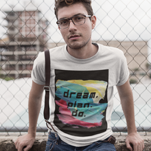 Load image into Gallery viewer, Man wearing a white tee shirt with Dream Plan Do print
